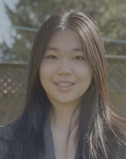A photo of Barberry. She is a young Asian woman and is smiling.