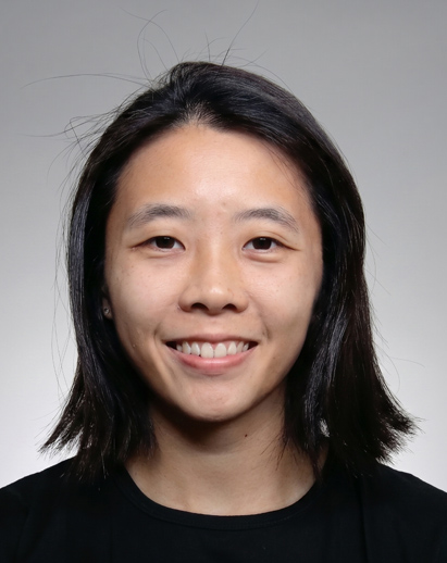 A photo of Delphine. She is a young Asian woman and is smiling.