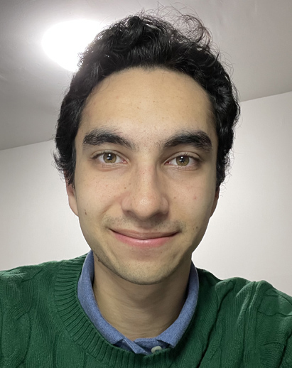 A photo of Joey. He is a young man and is smiling.