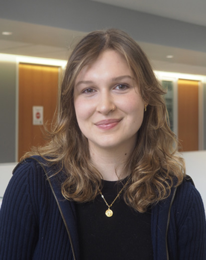 A photo of Jordyn. She is a young white woman and is smiling.