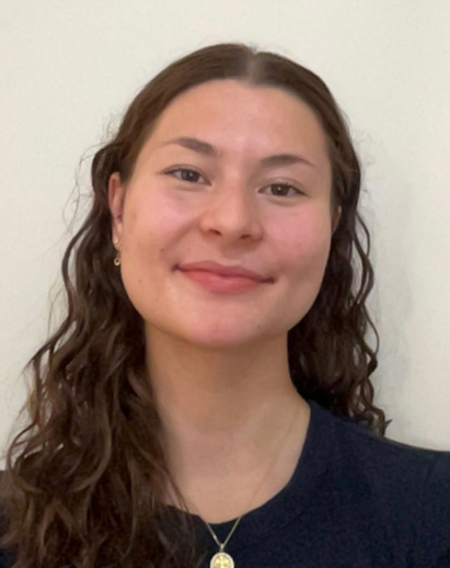 A photo of Krista. She is a young woman and is smiling.