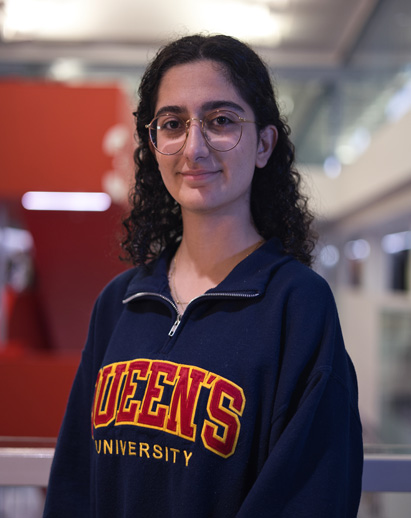 A photo of Negar. She is a young Middle Eastern woman and is smiling.